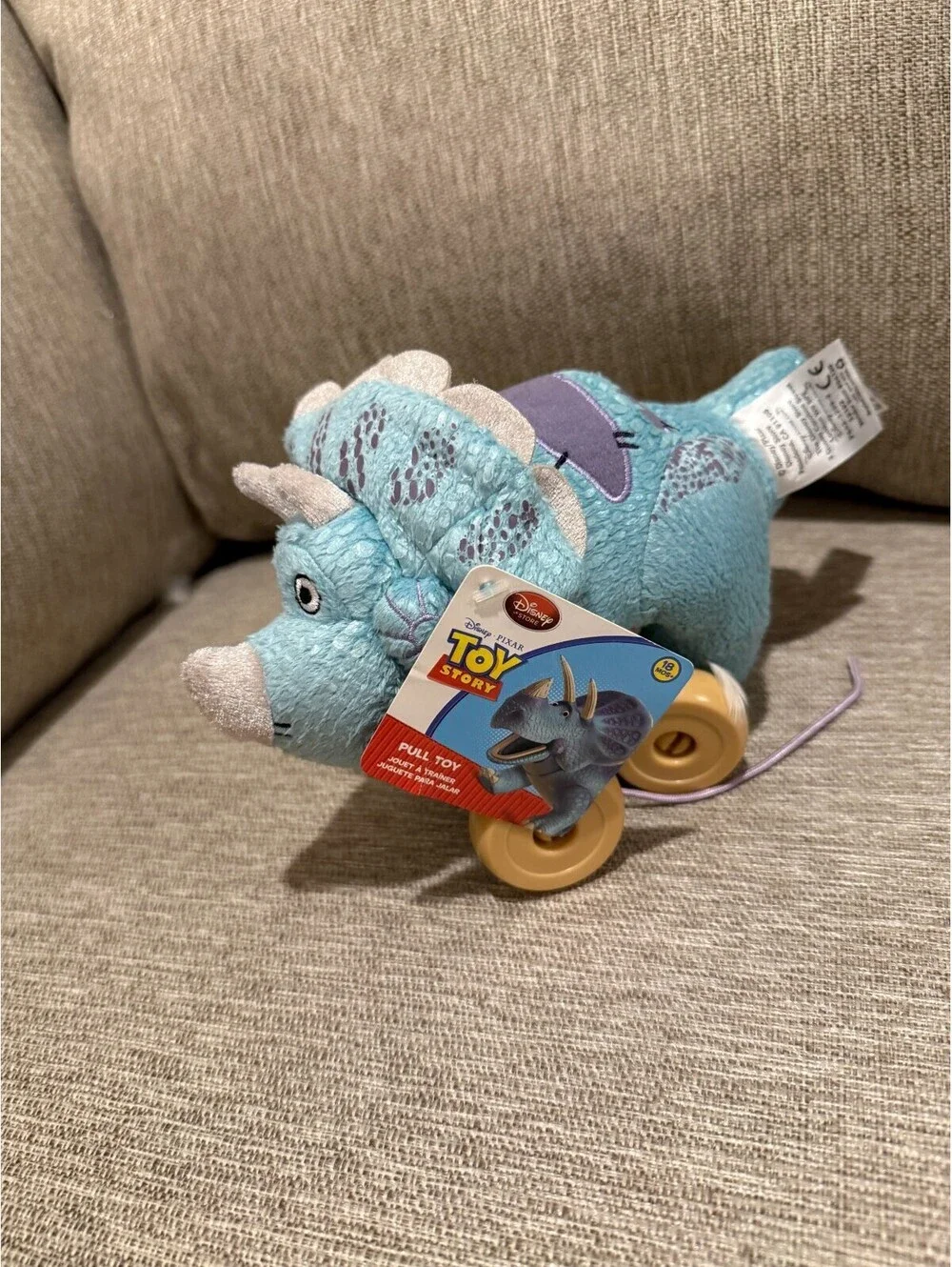 Disney Pixar Toy Story Trixie Triceratops Plush Pull Toy Wheels RARE NWT